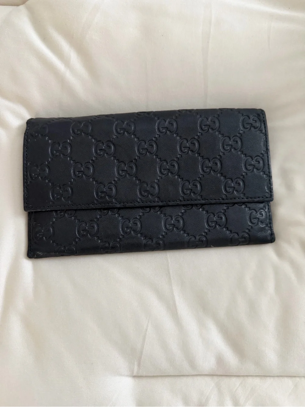 Gucci Guccissima Leather Continental Flap Wallet.